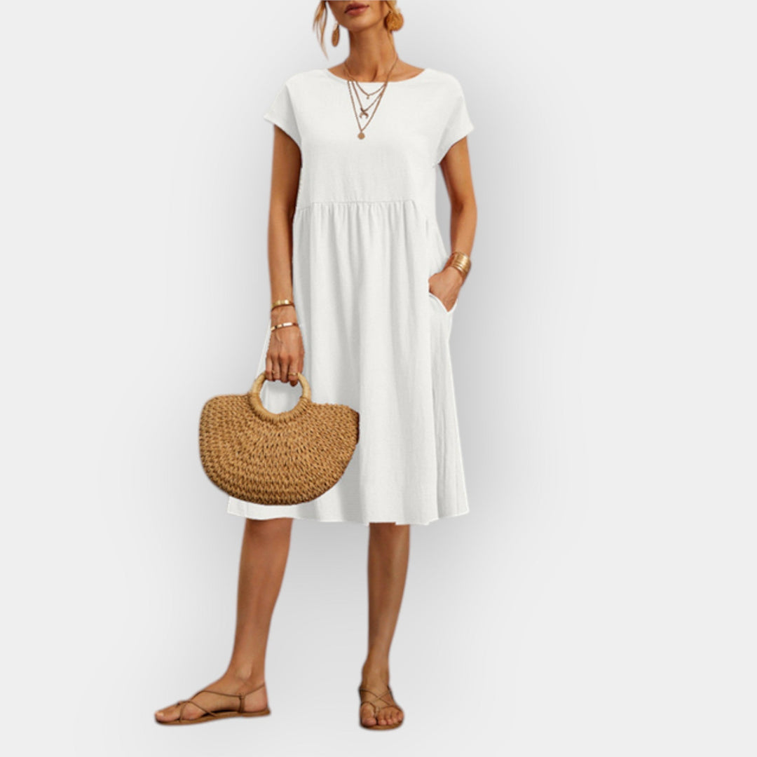 Midi šaty s jednoduchými liniemi