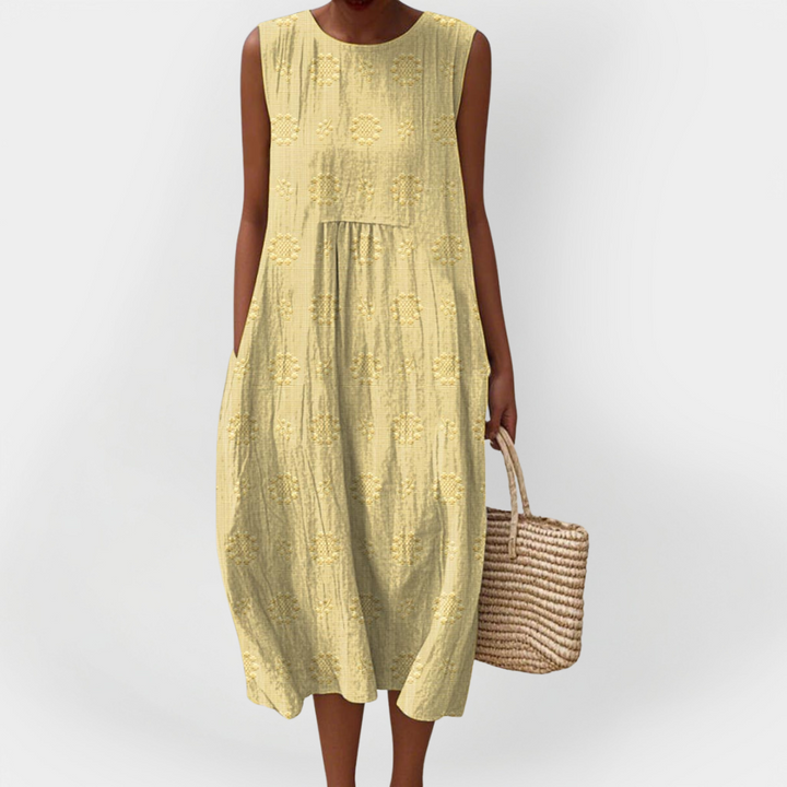 Elegantní bezrukávové šaty z bavlny s kapsami