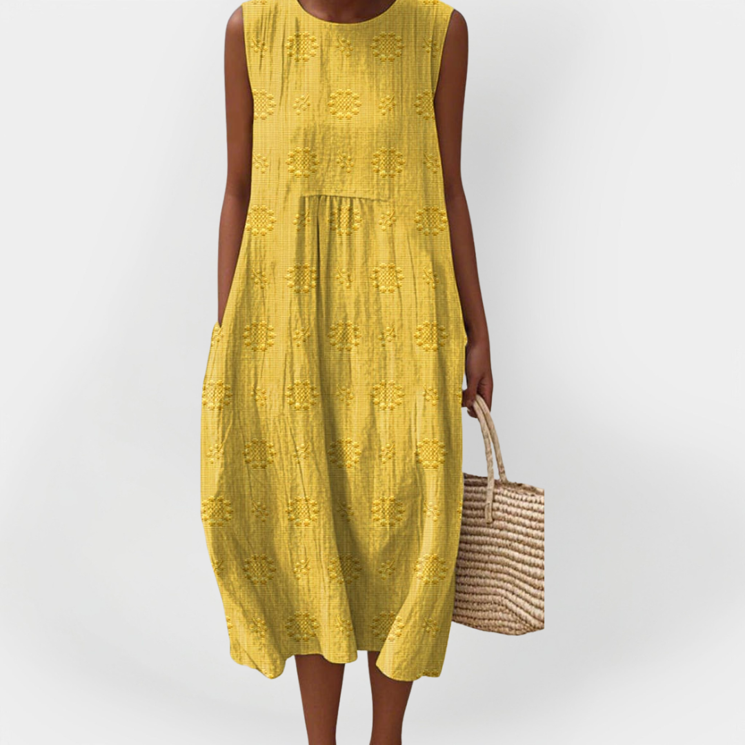 Elegantní bezrukávové šaty z bavlny s kapsami