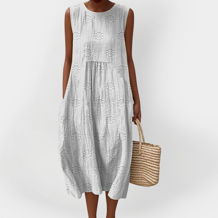 Elegantní bezrukávové šaty z bavlny s kapsami