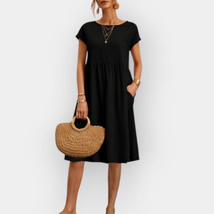 Midi šaty s jednoduchými liniemi